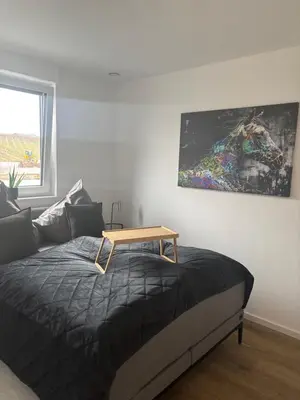 Ein Bett oder Betten in einem Zimmer der Unterkunft FeWo Riesling
