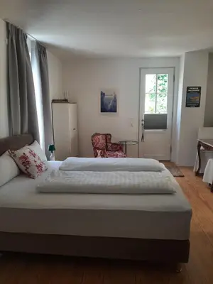 Ein Bett oder Betten in einem Zimmer der Unterkunft Mosel statt Mallorca