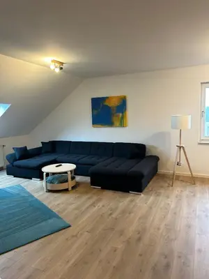 Ein Sitzbereich in der Unterkunft Haus des Schneiders