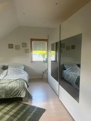 Ein Bett oder Betten in einem Zimmer der Unterkunft Chez Ellie- Ferienwohnung Nähe Nürburgring, Rhein, Ahr, Eifel
