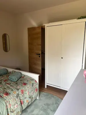 Ein Bett oder Betten in einem Zimmer der Unterkunft Chez Ellie- Ferienwohnung Nähe Nürburgring, Rhein, Ahr, Eifel