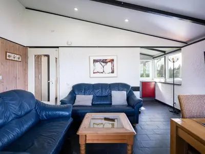 Ein Sitzbereich in der Unterkunft Holiday Home Haus 30 by Interhome