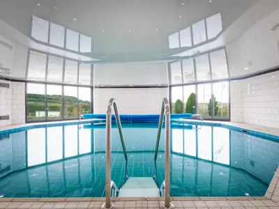 Der Swimmingpool an oder in der Nähe von Holiday Home Holzchalet A-D by Interhome