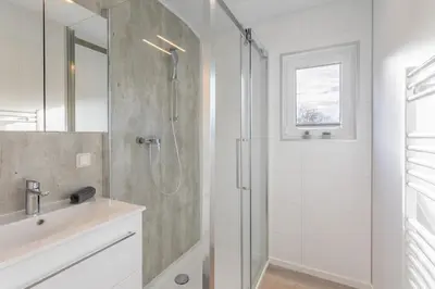 Ein Badezimmer in der Unterkunft Chalet Viadukt I Terrasse I Seeblick I Wandern