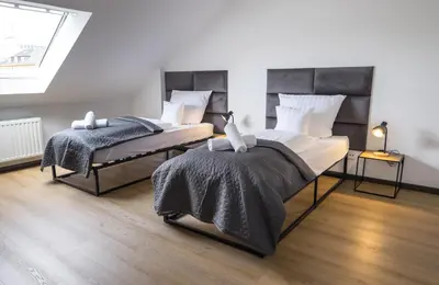 Ein Bett oder Betten in einem Zimmer der Unterkunft Über den Dächern von Koblenz