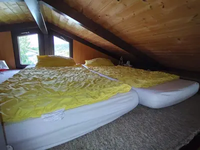 Ein Bett oder Betten in einem Zimmer der Unterkunft Ferienhaus Max in Koblenz-Güls Am Gülser Moselbogen
