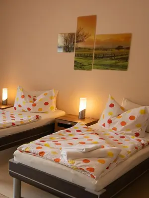 Ein Bett oder Betten in einem Zimmer der Unterkunft Traumferienwohnung an der Mosel - Gabi Schöneberg