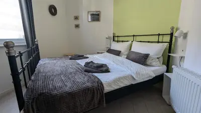 Ein Bett oder Betten in einem Zimmer der Unterkunft Rheinsteig-Ferienwohnungen 5 Apartments