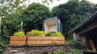 Ein Garten an der Unterkunft Ferienwohnung Nostalgie in Bruttig-Fankel für 1 - 3 Personen