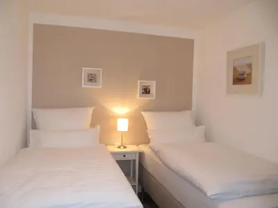 Ein Bett oder Betten in einem Zimmer der Unterkunft Pension Willebuhr