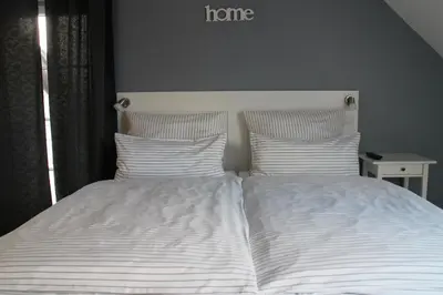 Ein Bett oder Betten in einem Zimmer der Unterkunft Pension Willebuhr