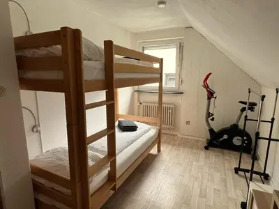 Ein Bett oder Betten in einem Zimmer der Unterkunft Ruhiges Ferienhaus in Burgnähe