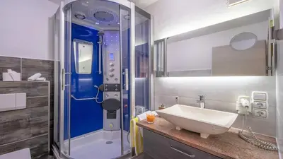 Ein Badezimmer in der Unterkunft Ferienwohnung Apartment Seehöhe - im Maarberg Resort - in Schalkenmehren am See