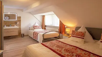 Ein Bett oder Betten in einem Zimmer der Unterkunft Ferienhaus City Ferienhaus Daun
