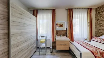 Ein Bett oder Betten in einem Zimmer der Unterkunft Ferienhaus City Ferienhaus Daun