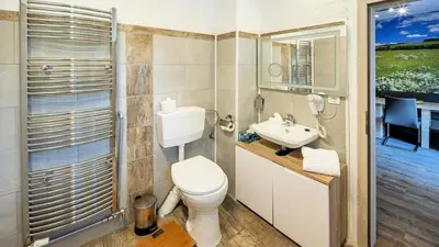 Ein Badezimmer in der Unterkunft Ferienhaus City Ferienhaus Daun