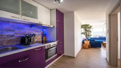 Küche/Küchenzeile in der Unterkunft Ferienwohnung Ferienwohnung Maarhöhe - im Maarberg Resort - in Schalkenmehren am See