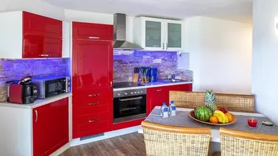 Küche/Küchenzeile in der Unterkunft Ferienwohnung Maarpanorama - im Maarberg Resort - in Schalkenmehren am See
