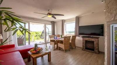 TV/Unterhaltungsangebot in der Unterkunft Ferienwohnung Maaridyll - im Maarberg Resort - in Schalkenmehren am See