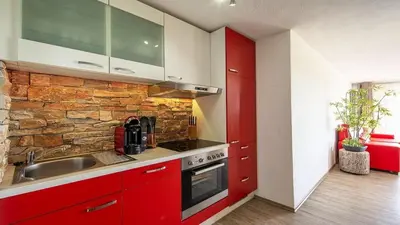 Küche/Küchenzeile in der Unterkunft Ferienwohnung Maaridyll - im Maarberg Resort - in Schalkenmehren am See