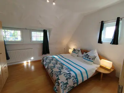 Ein Bett oder Betten in einem Zimmer der Unterkunft Ferienwohnung Daun
