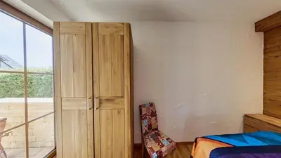 Ein Bett oder Betten in einem Zimmer der Unterkunft Ferienwohnung Luxus 5 Sterne Ferienwohnung - Chalet Seenähe