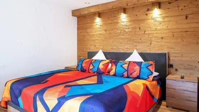 Ein Bett oder Betten in einem Zimmer der Unterkunft Ferienwohnung Luxus 5 Sterne Ferienwohnung - Chalet Seenähe