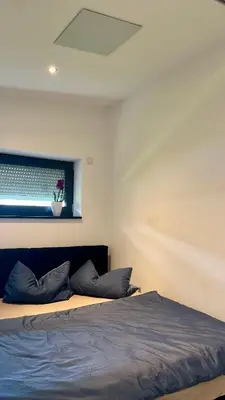 Ein Bett oder Betten in einem Zimmer der Unterkunft Ferienwohnung an der Wildenburg