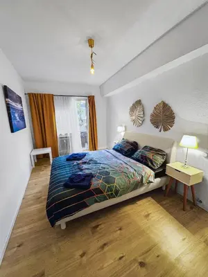 Ein Bett oder Betten in einem Zimmer der Unterkunft Zentrale Wohnung