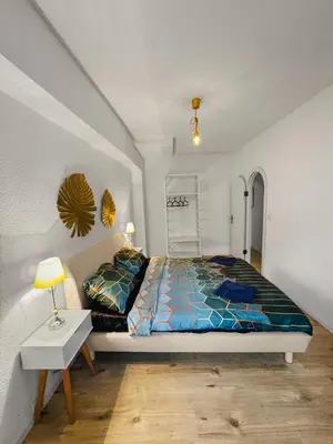 Ein Bett oder Betten in einem Zimmer der Unterkunft Zentrale Wohnung