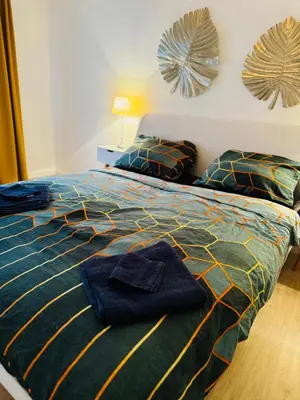 Ein Bett oder Betten in einem Zimmer der Unterkunft Zentrale Wohnung