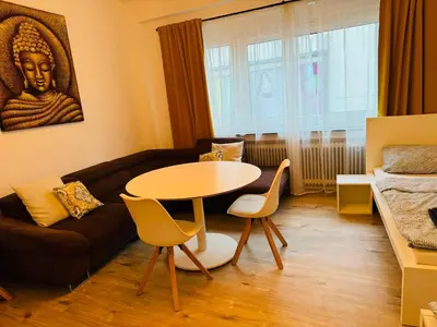 Ein Sitzbereich in der Unterkunft Zentrale Wohnung