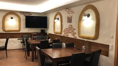 Ein Sitzbereich in der Unterkunft Rheinliebe Bistro und Pension