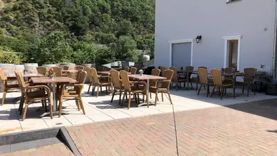 Ein Restaurant oder anderes Speiselokal in der Unterkunft Rheinliebe Bistro und Pension