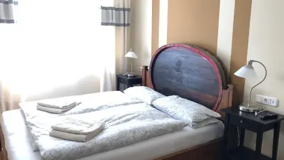 Ein Bett oder Betten in einem Zimmer der Unterkunft Rheinliebe Bistro und Pension
