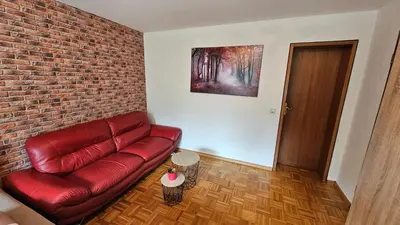 Ein Sitzbereich in der Unterkunft Föhren Apartment