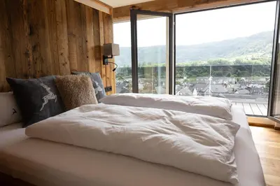 Ein Bett oder Betten in einem Zimmer der Unterkunft MoseLay Ferienwohnung Appartement
