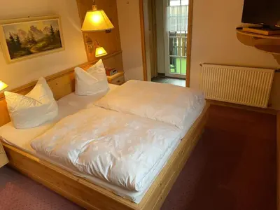 Ein Bett oder Betten in einem Zimmer der Unterkunft Gästehaus Neier