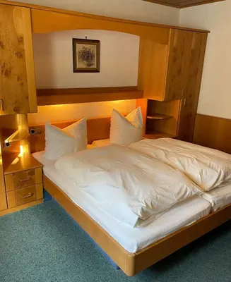 Ein Bett oder Betten in einem Zimmer der Unterkunft Gästehaus Neier