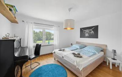 Ein Bett oder Betten in einem Zimmer der Unterkunft Amazing Apartment In Gillenfeld