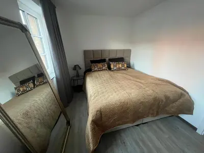 Ein Bett oder Betten in einem Zimmer der Unterkunft Schöne Ferienwohnung im Herzen von Prüm
