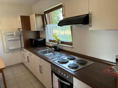 Küche/Küchenzeile in der Unterkunft Ferienwohnung Burg Katz