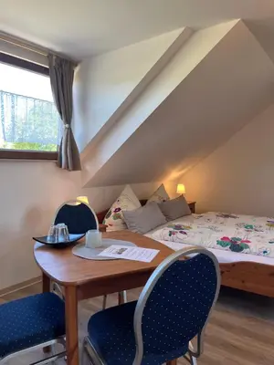 Ein Bett oder Betten in einem Zimmer der Unterkunft Ferienwohnung Burg Maus