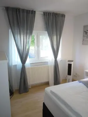 Ein Bett oder Betten in einem Zimmer der Unterkunft Teufelsstein, Wandern, Ausblick, Freilichtbühne, Loreley, 3 Burgenblick, Rhein, 30m2 Terrasse, Grillen, Entspannen, Natur, Rodelbahn, WLAN, Parkplatz,