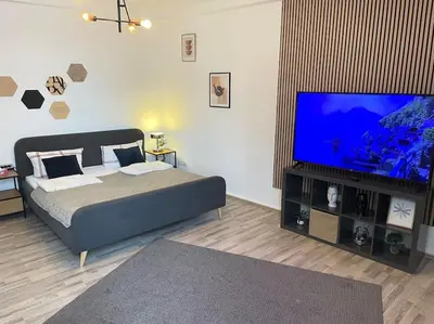 TV/Unterhaltungsangebot in der Unterkunft Schönes Apartment Mitten in der Stadt 4