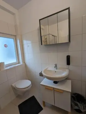 Ein Badezimmer in der Unterkunft Schönes Apartment Mitten in der Stadt 4