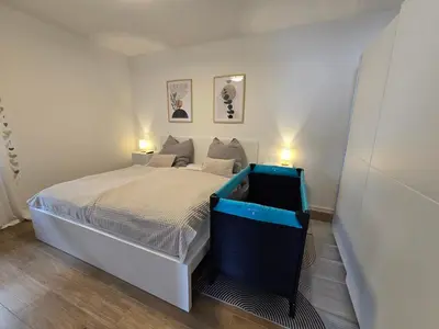 Ein Bett oder Betten in einem Zimmer der Unterkunft Ferienwohnung Oberreiter