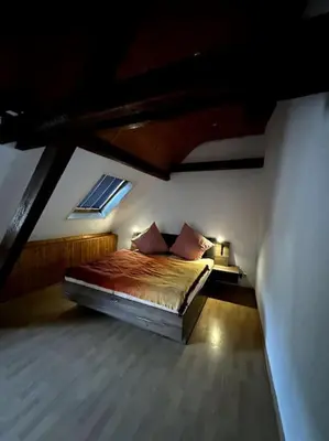 Ein Bett oder Betten in einem Zimmer der Unterkunft Fewo in Zell-Merl