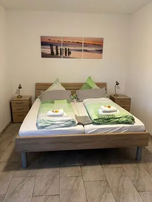 Ein Bett oder Betten in einem Zimmer der Unterkunft Haus Koblenz