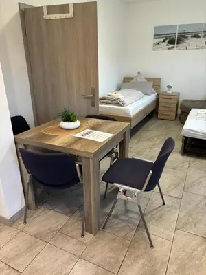 Ein Bett oder Betten in einem Zimmer der Unterkunft Haus Koblenz